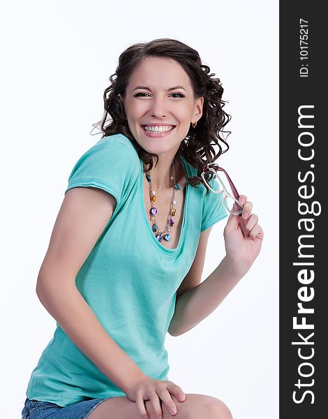 Young emotional woman on isolated background laughing