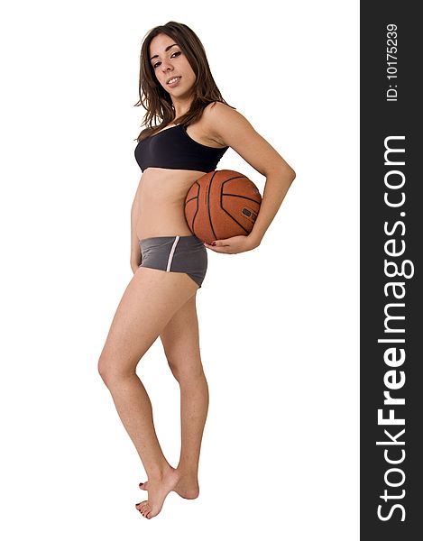 Young cute woman playing basketball. Young cute woman playing basketball