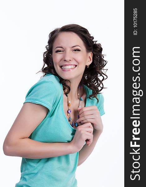 Young emotional woman on isolated background laughing