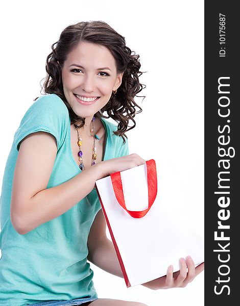 Young woman with shopping bag in different actions and emotions. Young woman with shopping bag in different actions and emotions
