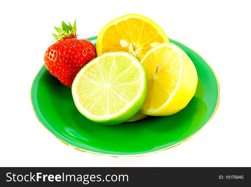 Citrus Fruit on a Green Plate