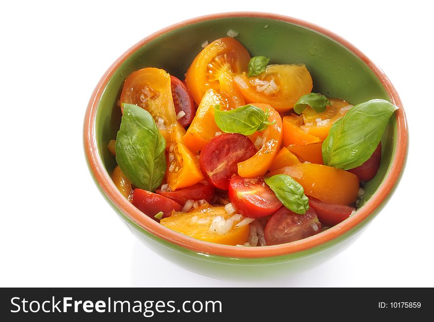 Colorful tomato salad in a bowl