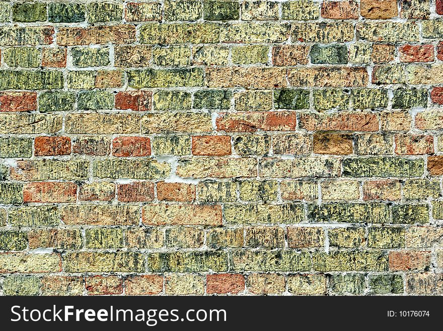 On a photo: Brick wall