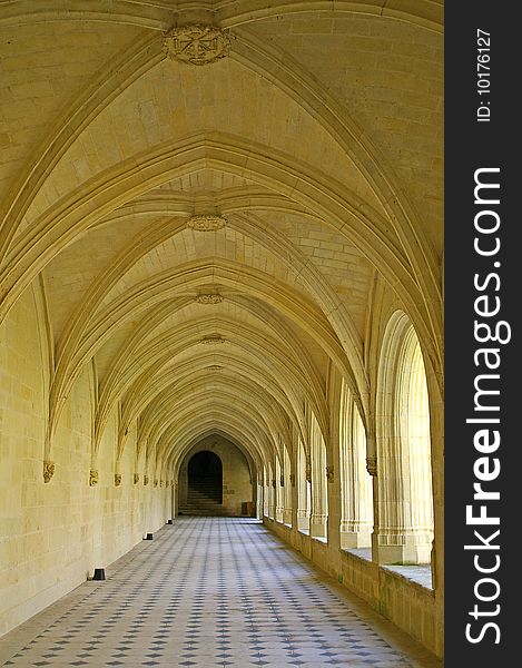 On a photo: Columned hall of a Abbey de Fontevro