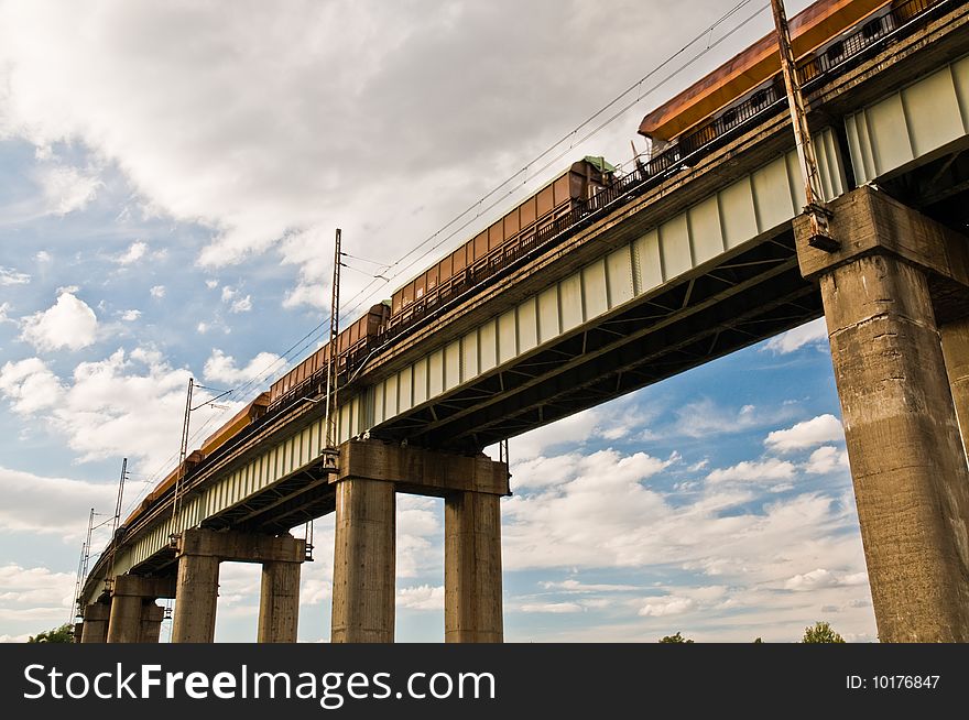 Nice clouds and a bridge with railroad