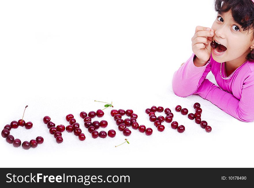 Cute girl is laying on ground with cherry note