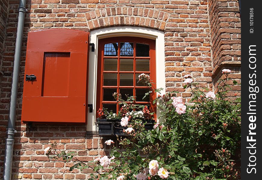 Retro/Old window in a brick wall. Retro/Old window in a brick wall