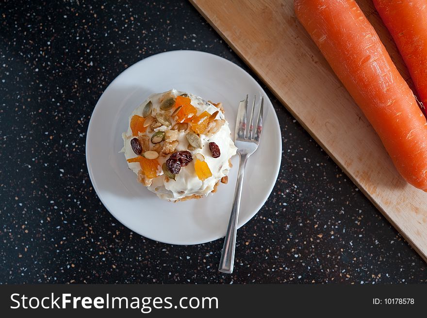 An image of a carrot cake freshly made and ready to eat. An image of a carrot cake freshly made and ready to eat