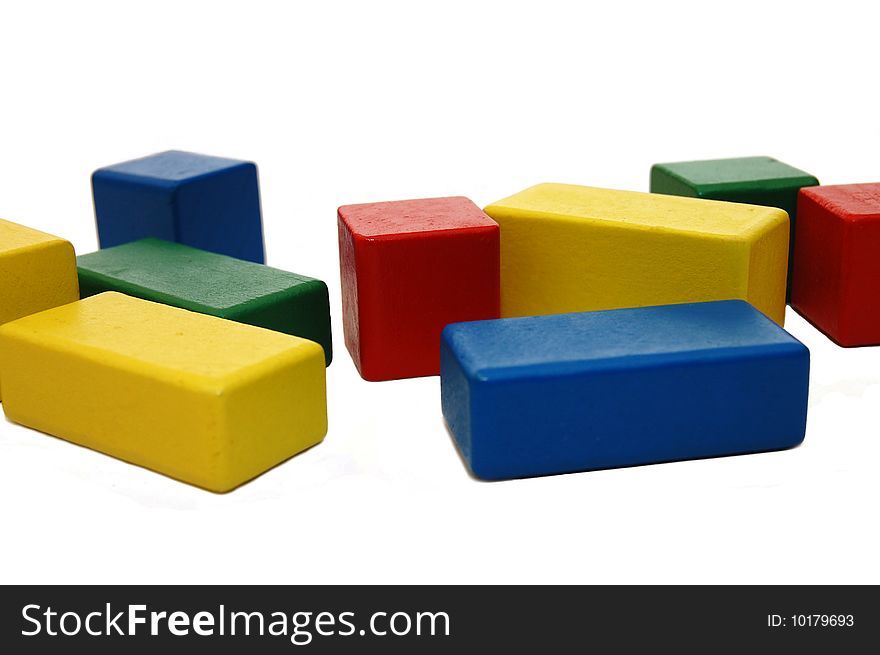 Wooden colourful children block isolated white. Wooden colourful children block isolated white