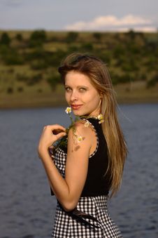 Nice Girl On The Lake Coast With Camomiles Stock Photo Nice Girl On The Lake Coast With Camomiles Stock Photo