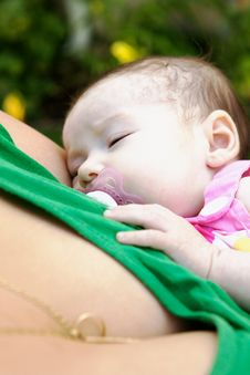Baby Being Held By Mother Stock Photography