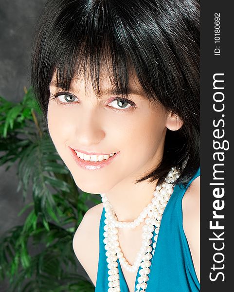 Gorgeous girl with pearl necklace, studio shot. Gorgeous girl with pearl necklace, studio shot