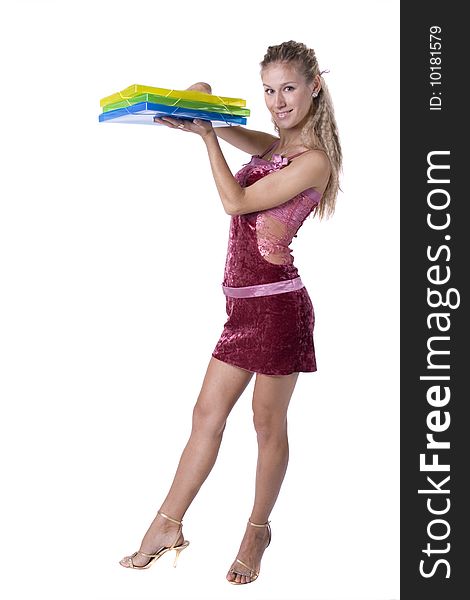 The young beautiful businesswoman at office behind work on a white background. The young beautiful businesswoman at office behind work on a white background