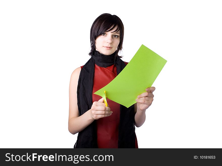 The young beautiful businesswoman at office behind work on a white background. The young beautiful businesswoman at office behind work on a white background