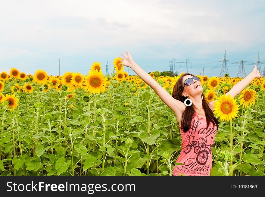 Attractive Young Girl In  Sunflower Field