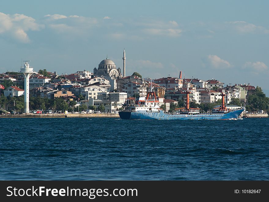 Cargo ship passing through Straits of Bhosporus. Istanbul. Turkey