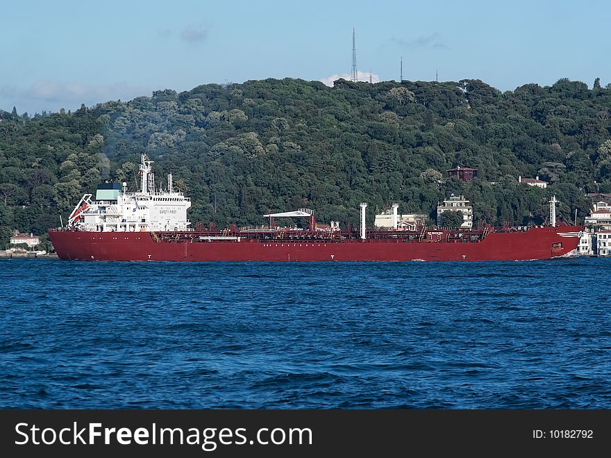 Cargo ship passing through Straits of Bhosporus. Istanbul. Turkey