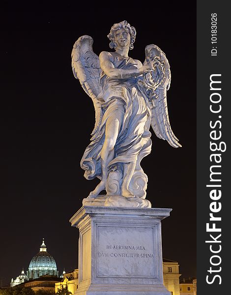 A Bernini's angel with San Peter cupola in background