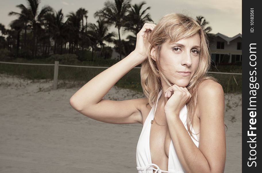 Attractive Young Woman On The Beach