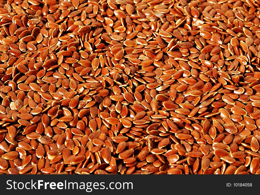 Heap of flaxseed (texture, background)
