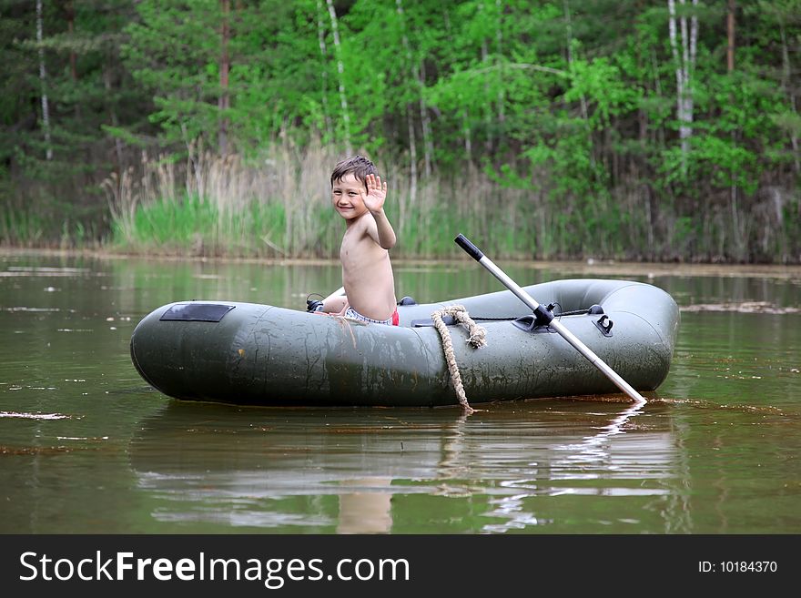 Boy In Boat