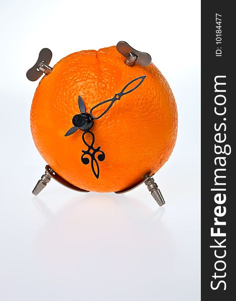 An orange made to be a clock. An orange made to be a clock.