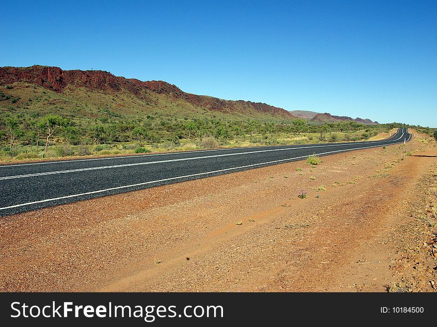 Road in the Macdonnell Range - Australian desert. Road in the Macdonnell Range - Australian desert.