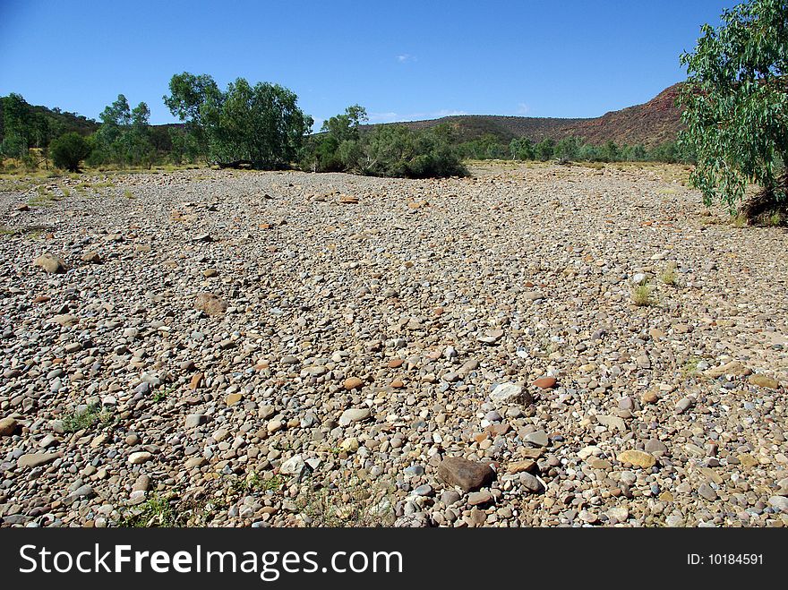 View of the dry bed of the Finke River, Northern Territory - Australia. View of the dry bed of the Finke River, Northern Territory - Australia.