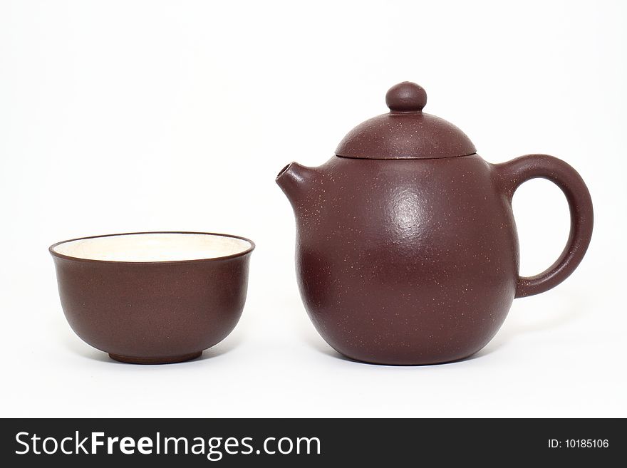 Ceramic teapot has been isolated from the standard design in white