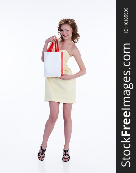 Young Emotional Woman With Paper Bag