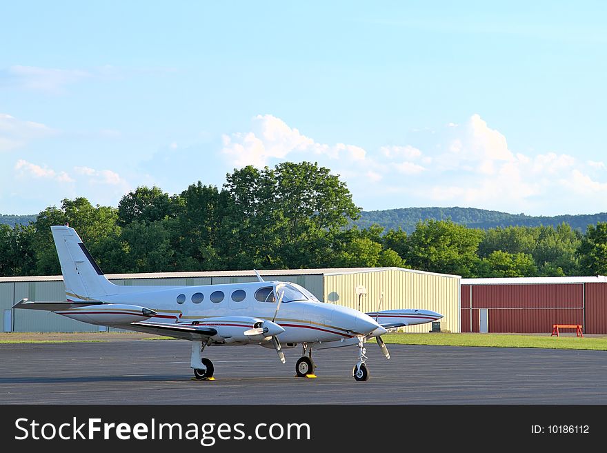 Twin engine aircraft sits on the ramp. Twin engine aircraft sits on the ramp.