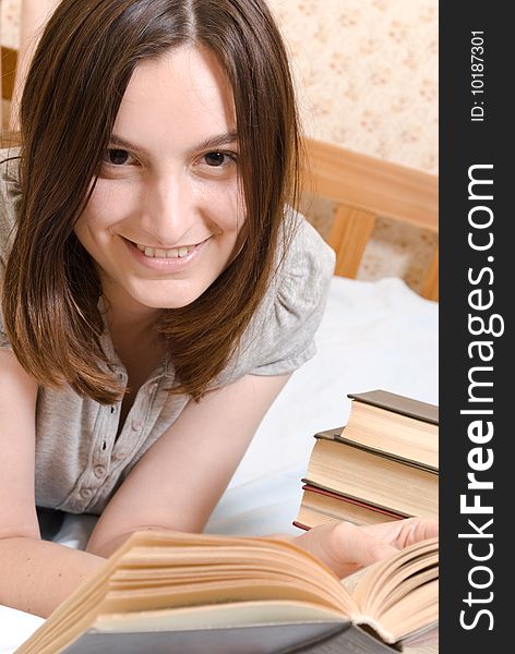 Young smiling student woman with books. Young smiling student woman with books