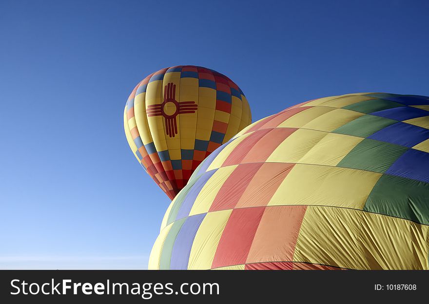 Hot air balloon on the ground and on the air