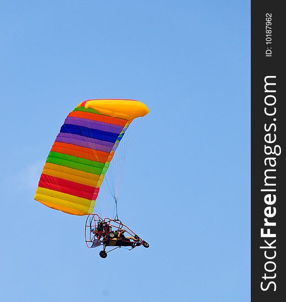 Parachute with special engined fan rising into the sky