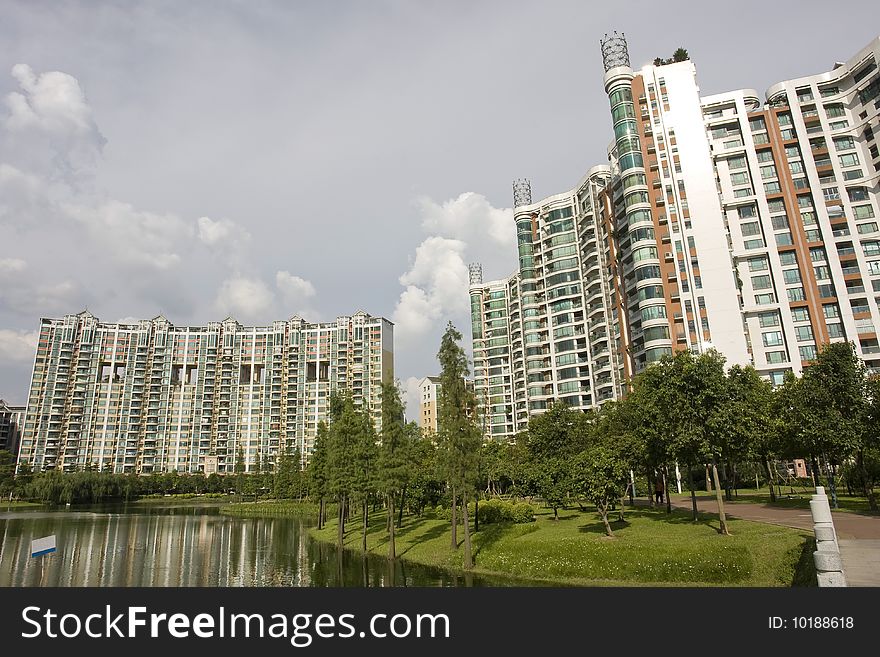 Chinese peaceful community with some modern buildings beside the lake. Chinese peaceful community with some modern buildings beside the lake