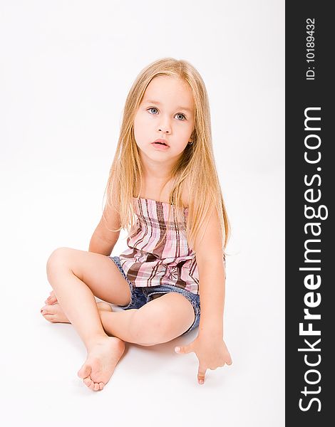 Beautiful little girl with long blonde hair