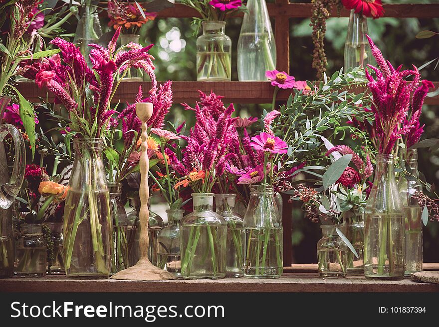 Cockscomb, Chinese Wool Flower and gerbera flowers in vase adorned in beautiful colors vintage used as background text.