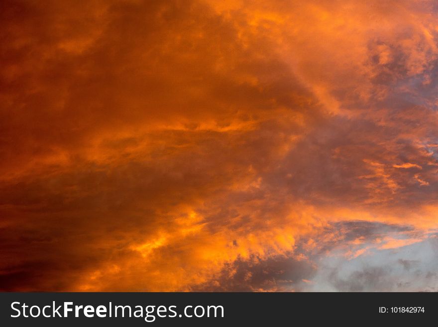 Summer sunset sky with clouds of red color. Summer sunset sky with clouds of red color.