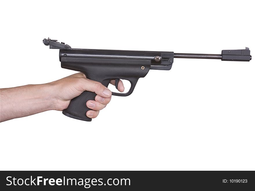 Hand with weapon of the black color on white background
