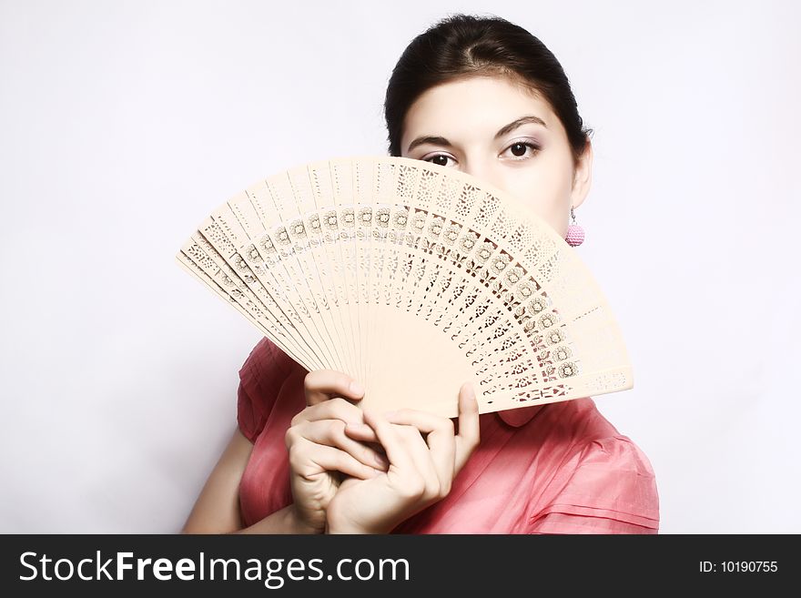 Portrait of the girl with a fan.
