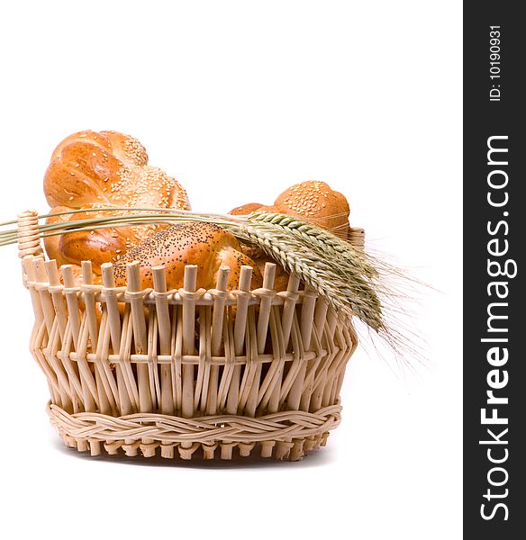 Fresh Baked Rolls In A Basket On White