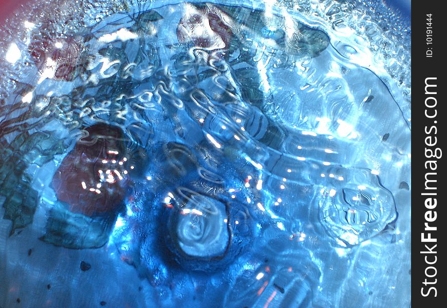 This was taken inside a blue water tank, with waves and ripples and a strong spot light that came out very cool,. This was taken inside a blue water tank, with waves and ripples and a strong spot light that came out very cool,