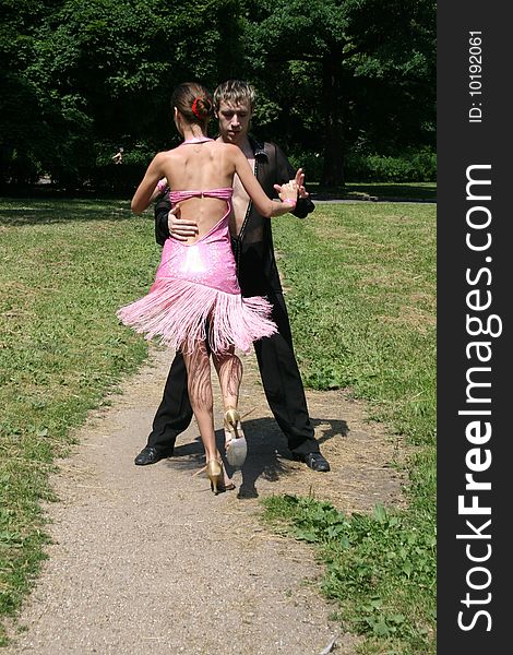 Romantic couple dancing in a park