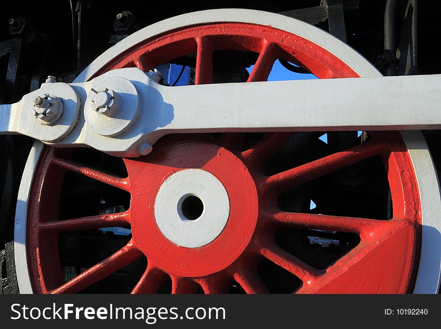 Red wheel of an old steam locomotive. Red wheel of an old steam locomotive