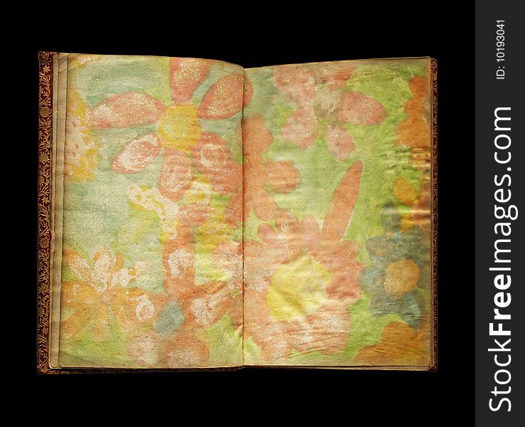 Aged book with flowers close up