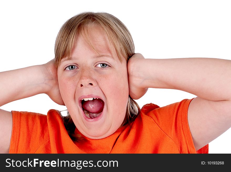 A young girl screaming and covering her ears