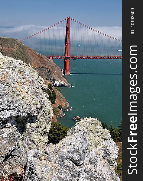 Golden Gate Bridge And Rock