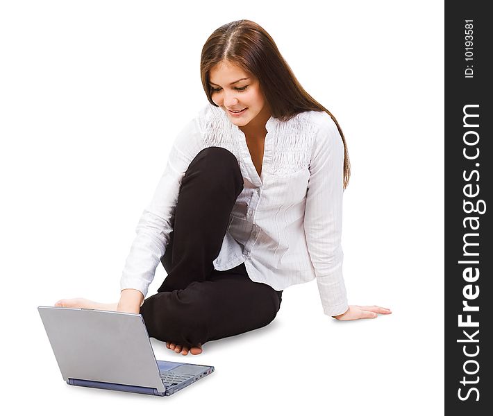 Young attractive smiling businesswoman working  with laptop. Young attractive smiling businesswoman working  with laptop