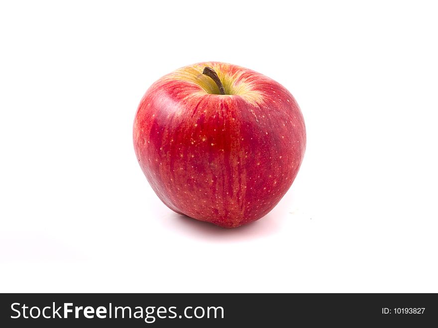 Single red apple against a white background