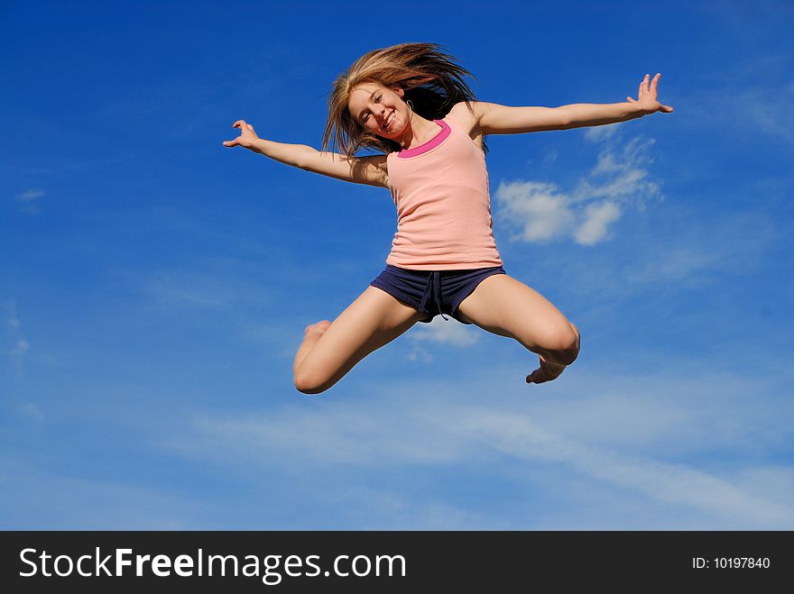 Girl jump high up in the air